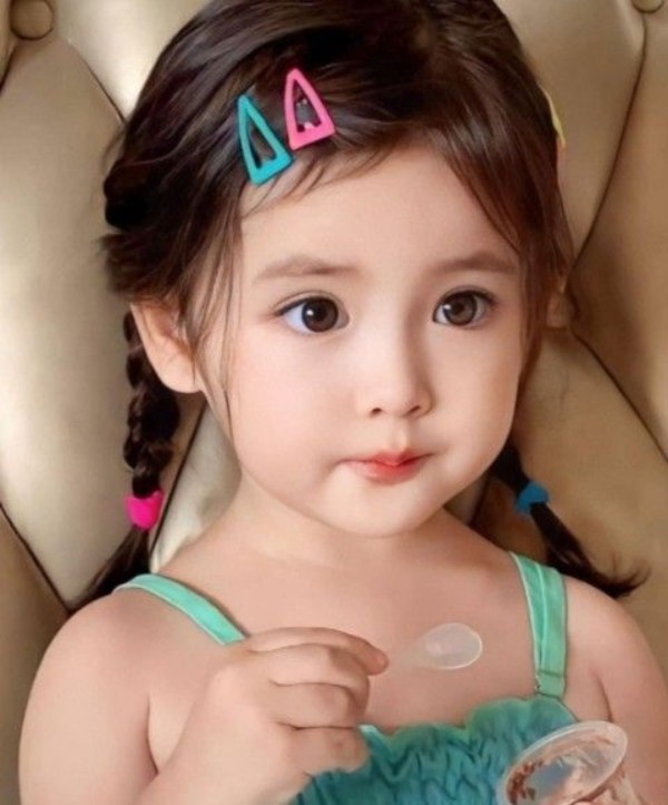 Tết tóc bẹ dừa hai bên cho bé