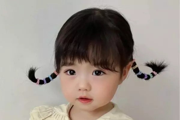 Buộc tóc đốt tre cho bé tóc ngắn